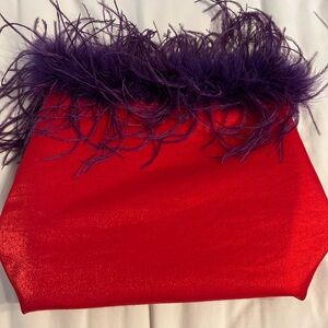 Red Hatter’s bag with purple fringe